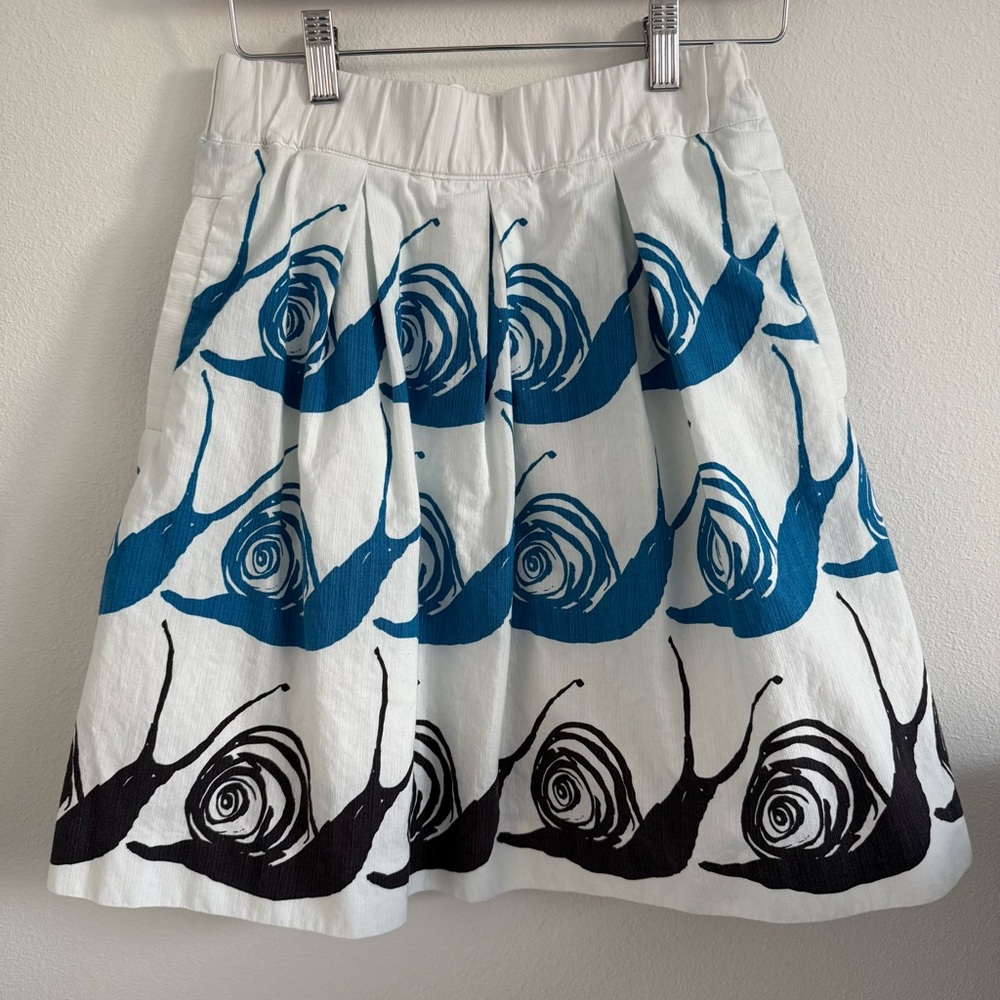 Anthropologie Maeve White Mini Skirt with Blue and Black Snail Motif